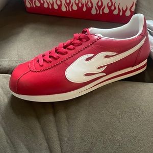 The flame man red shoes,  size 12. Brand new.